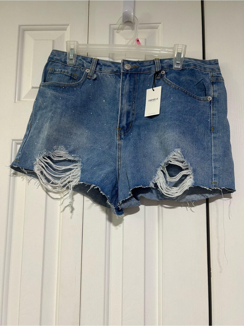 Blue denim shorts with rhinestones